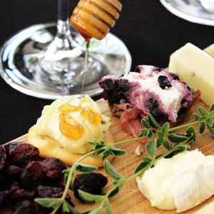 Fresh local honey on a charcuterie board at Chapin Family Vineyards in Temecula