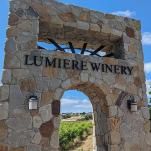 The plus Lumiere Winery Temecula sign in Wine Country